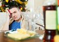 Man having hangover after New year party