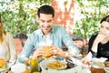 Man Having Joy Eating Burger