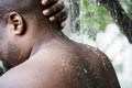 Man having an outdoor shower Royalty Free Stock Photo