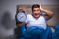 The man having trouble sleeping in bed Royalty Free Stock Photo