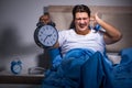 The man having trouble sleeping in bed Royalty Free Stock Photo