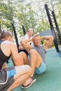 Man having workout with friends Royalty Free Stock Photo