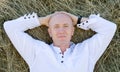 Man on hay Royalty Free Stock Photo