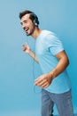 Man headphone space copy sing studio online fun music t-shirt lifestyle blue portrait happy