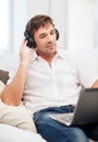 Man with headphones listening to music Royalty Free Stock Photo