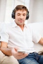 Man with headphones listening to music Royalty Free Stock Photo