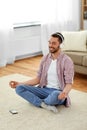 Man in headphones meditating listening to music Royalty Free Stock Photo