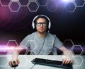 Man in headset computer over hexagons projection