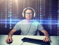 Man in headset hacking computer or programming Royalty Free Stock Photo