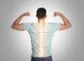 Man with healthy back on background. Spine pain prevention Royalty Free Stock Photo