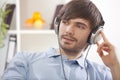 Man hearing music at home