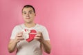 man with a heart-shaped gift box Royalty Free Stock Photo