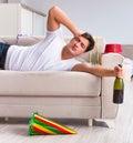 Man after heavy christmas partying at home