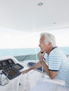 Man At The Helm Of Luxury Yacht Royalty Free Stock Photo