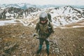 Man with helmet and ice axe climbing in mountains Royalty Free Stock Photo