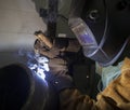 Man in helmet welding