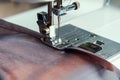 A man hem a curtain on a sewing machine. Sewing, hobbies, hobby, home improvement