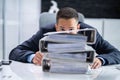 Man Hiding Behind Stack Or Pile Of Invoices