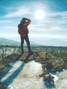 Man hiker with backpack in winter time walk Royalty Free Stock Photo