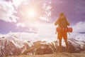 Man hiker greeting rich nature on the top of mountain Royalty Free Stock Photo