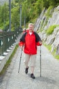 The man hikes on trail in mountains Royalty Free Stock Photo