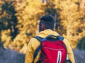 Man hiking with backpack Carpathian Mountains on scenic view Travel Lifestyle wanderlust adventure outdoor into the wild Royalty Free Stock Photo