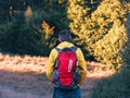 Man hiking with backpack Carpathian Mountains on scenic view Travel Lifestyle wanderlust adventure outdoor into the wild Royalty Free Stock Photo