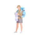 Man with hiking backpack explores the map. Young guy traveller in sportswear. Adventure tourism, travel and discovery