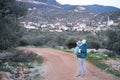 Man hiking in mountains,carrying baby in bacpack,sling,carrier.Family travelling,trips,lifestyle.Father,child,infant