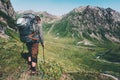 Man hiking at mountains with heavy big backpack Travel Lifestyle Royalty Free Stock Photo
