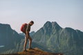 Man hiking in mountains travel backpacking summer vacations outdoor