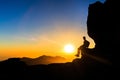Man hiking silhouette in mountains sunset freedom