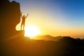 Man hiking silhouette in mountains, ocean and sunset