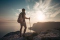 Man hiking at sunset mountains with heavy backpack Royalty Free Stock Photo