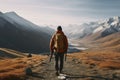 Man hiking at sunset mountains with heavy backpack Travel Lifestyle wanderlust adventure concept summer vacations outdoor alone Royalty Free Stock Photo