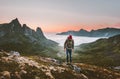 Man hiking survival in mountains alone outdoor active lifestyle Royalty Free Stock Photo