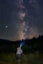 Man hiking undeer Milky Way Royalty Free Stock Photo