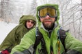 Man is hiking in winter forest on cloudy day Royalty Free Stock Photo