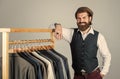 Man hipster fashion designer tailored suits collection, tailor services concept