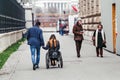 man with his beloved disabled girlfriend on a wheelchair is traveling around the city of Vienna Royalty Free Stock Photo