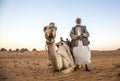 Man with his camel in a desert in Sudan Royalty Free Stock Photo