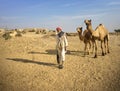 Man With His Camels in Thar Desert