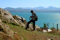 Man with his camera ready for shooting photo on Sevan Peninsula, Lake Sevan, Armenia Royalty Free Stock Photo