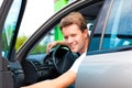 Man in his car at petrol station Royalty Free Stock Photo