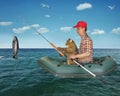 Man with his cat caught a fish 2 Royalty Free Stock Photo