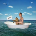 Man with his cat drift on the sea 2 Royalty Free Stock Photo