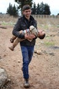 Man with his child illegaly entering Turkey