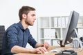 Man at his computer table Royalty Free Stock Photo