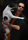 man with his dog in his arms Royalty Free Stock Photo