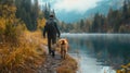 A man and his dog exploring a tranquil lakeside trail, the dog excitedly leading the way Royalty Free Stock Photo